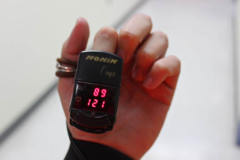 Checking oxygen levels and heart rate. Low elevation oxygen levels should be ~100. High 80s is good on the summit, low 70s and you're about to pass out. Yes, after being outside my heart was working extremely hard to warm up and gather enough oxygen.