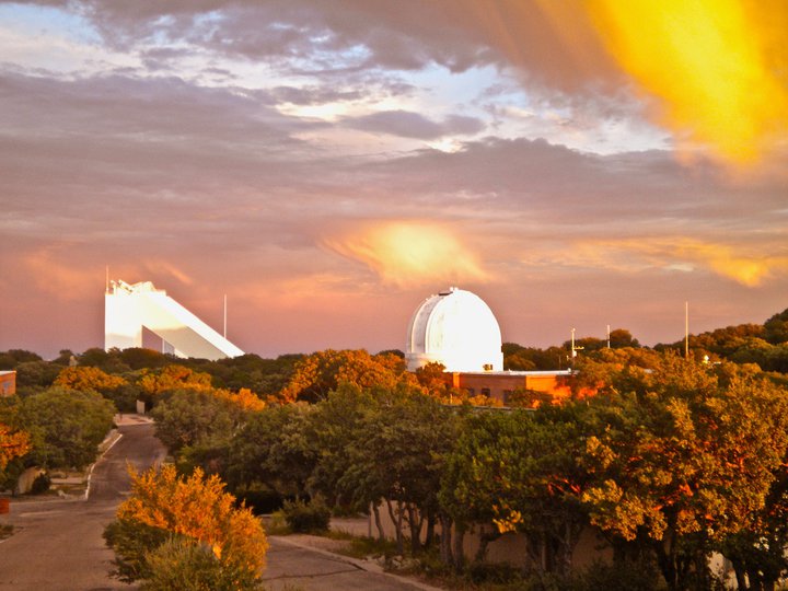 Looking down the hill from sunset, toward the McMath-Pierce Solar Telescope, which looks like a sideways seven.