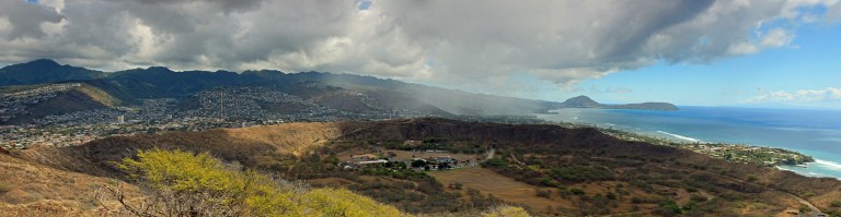 Another classic example of a stormy Hawaiian landscape juxtaposed against sunny coastlines. (We were in the stormy part, getting drizzled on as we hiked. But the cool rain was a welcome relief to the hot Sun we started out under!)