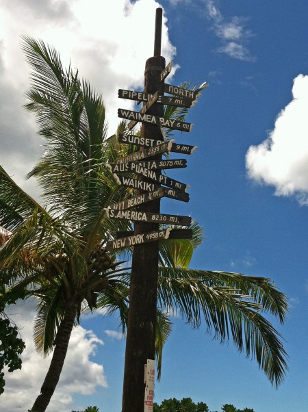 Fun sign in Hale'iwa detailing how far away different cities and countries are.