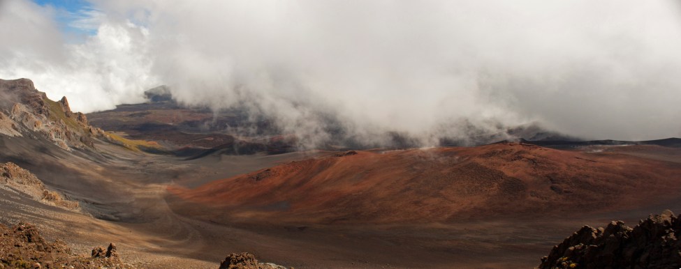 We warmed up in the Visitor Center and gift shop for about a half hour, while thick clouds filled the crater. Just as we were leaving, the clouds thinned enough to get a partial view of what normally makes for beautiful photographs.