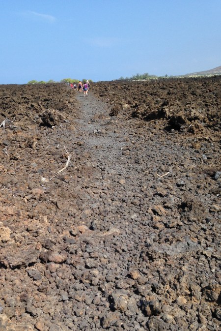 Hiking along a lava field toward Makalawena.
