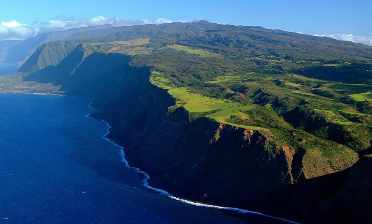 Molokai - photo courtesy of http://traveltoparadise.com/molokai/worlds-highest-sea-cliffs-on-molokai-hawaii/#prettyPhoto