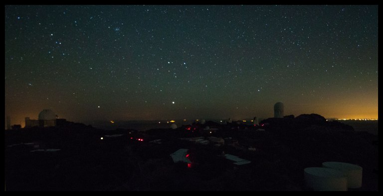 Looking down over the observatory grounds from the top of the McMath-Pierce Solar Telescope. Would probably look way cooler if the moon had just risen and the domes were illuminated just a bit!
