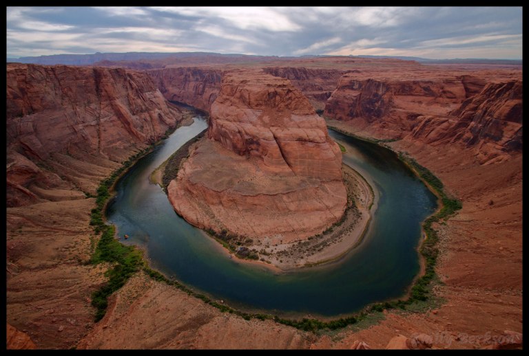 If it's awe-inspiring in pictures, imaging seeing it in person - absolutely breathtaking. At the very bottom, you can make out a small boat and campsite of some lucky people who spent the night down there. This is an HDR image, created from two photos exposed separately for the bright sky and darker canyon, and later merged together in Photoshop.