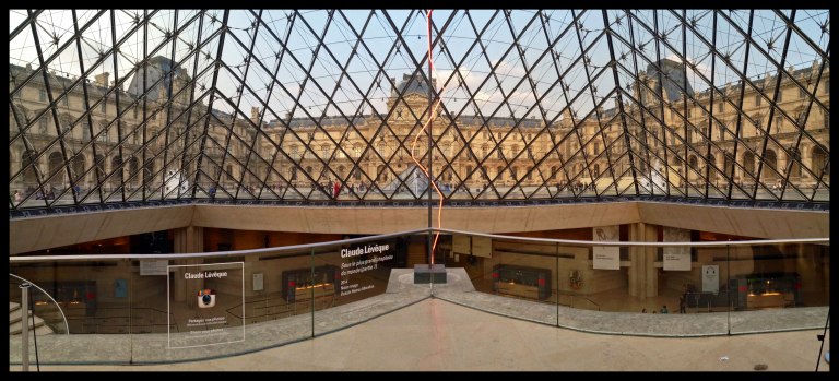 Inside the famous Louvre pyramid.