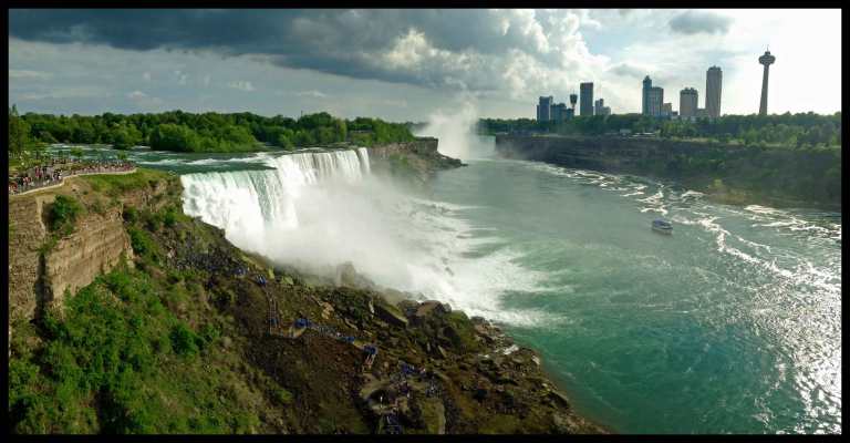 Wouldn't be a complete trip without the panorama. Falls in sunshine, park under storm clouds.